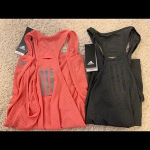 Pair of Adidas Tanks